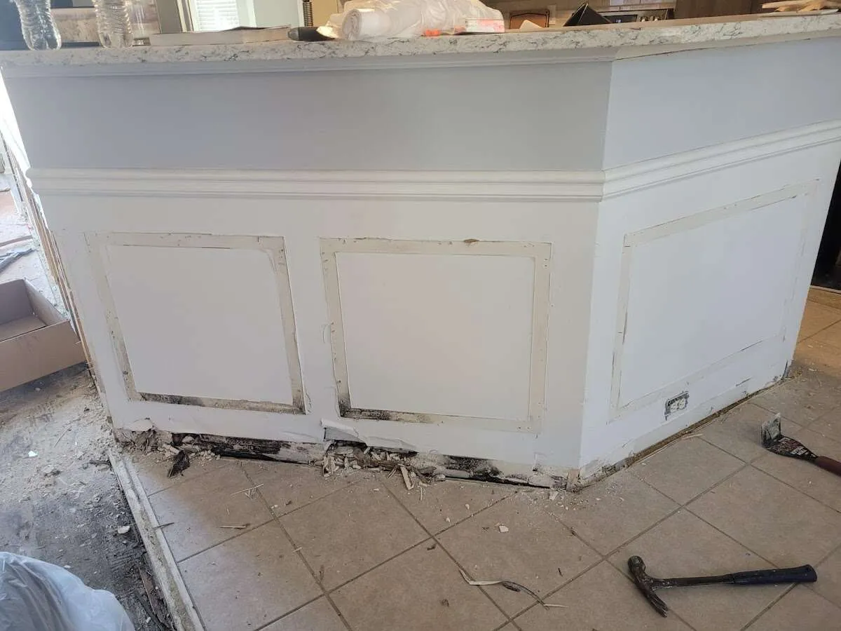 Water damage and mold on kitchen during Storm Damage Restoration in Larose
